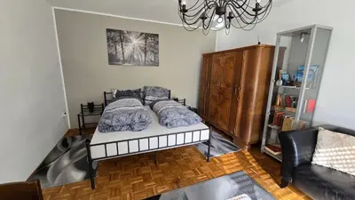 Ein Bett oder Betten in einem Zimmer der Unterkunft Ferienwohnung in Wartenberg