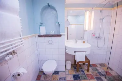 Ein Badezimmer in der Unterkunft Ringhotel Alpenhof - Patchworkhotel