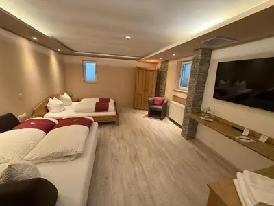 Ein Bett oder Betten in einem Zimmer der Unterkunft Hotel garni St.Georg