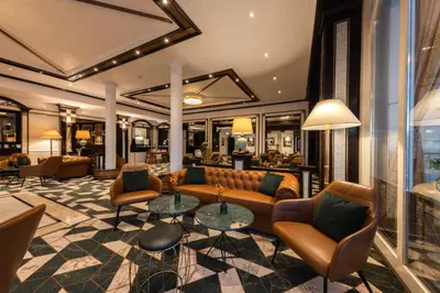 Ein Sitzbereich in der Unterkunft Hotel Tanneck