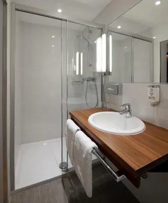 Ein Badezimmer in der Unterkunft Posthotel Kolberbräu