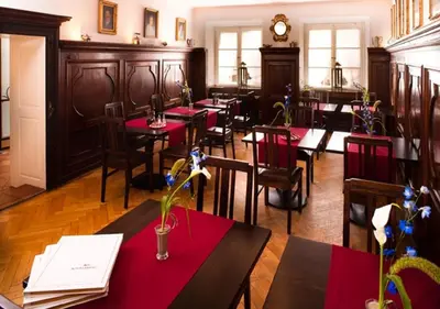 Ein Restaurant oder anderes Speiselokal in der Unterkunft Posthotel Kolberbräu