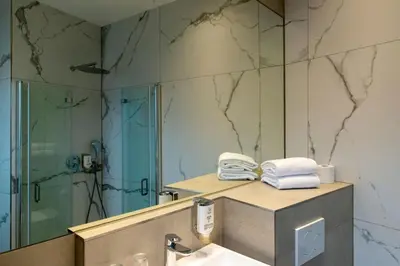 Ein Badezimmer in der Unterkunft Hotel Fischertor