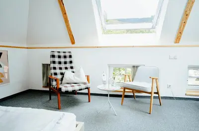 Ein Bett oder Betten in einem Zimmer der Unterkunft Alpenrose Bayrischzell Hotel