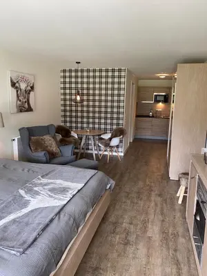 Ein Bett oder Betten in einem Zimmer der Unterkunft Apartment BERGliebe - schnuckelig, ruhige und zentrale Lage