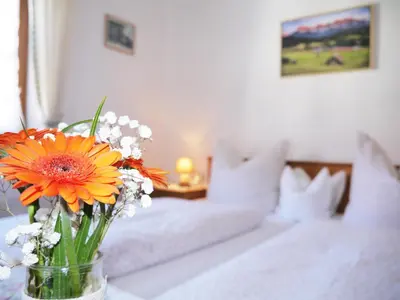 Ein Bett oder Betten in einem Zimmer der Unterkunft Gästehaus Alfred Klais