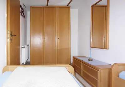 Ein Bett oder Betten in einem Zimmer der Unterkunft Gästehaus Alfred Klais