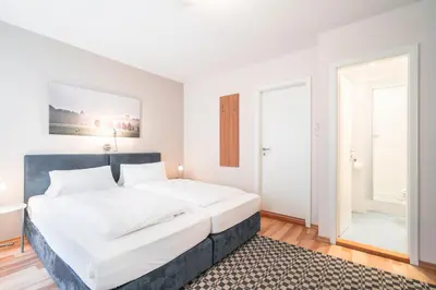 Ein Bett oder Betten in einem Zimmer der Unterkunft Flatista Boutique Hotel - Self Check-in