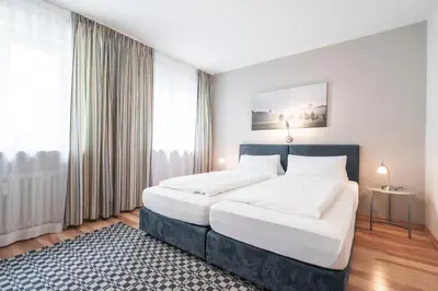 Ein Bett oder Betten in einem Zimmer der Unterkunft Flatista Boutique Hotel - Self Check-in