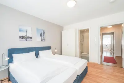 Ein Bett oder Betten in einem Zimmer der Unterkunft Flatista Boutique Hotel - Self Check-in