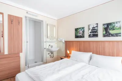 Ein Bett oder Betten in einem Zimmer der Unterkunft Flatista Boutique Hotel - Self Check-in
