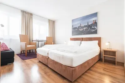 Ein Bett oder Betten in einem Zimmer der Unterkunft Flatista Boutique Hotel - Self Check-in