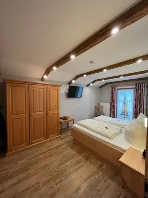 Ein Bett oder Betten in einem Zimmer der Unterkunft Gasthof Zum Ott