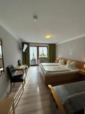 Ein Bett oder Betten in einem Zimmer der Unterkunft Gasthof Zum Ott