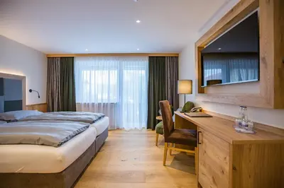 Ein Bett oder Betten in einem Zimmer der Unterkunft Hotel Friedenseiche