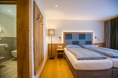 Ein Bett oder Betten in einem Zimmer der Unterkunft Hotel Friedenseiche