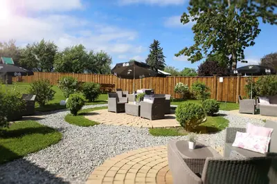 Ein Garten an der Unterkunft Hotel Friedenseiche