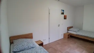 Ein Bett oder Betten in einem Zimmer der Unterkunft Pension Chen