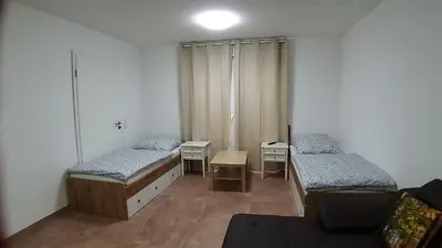 Ein Bett oder Betten in einem Zimmer der Unterkunft Pension Chen