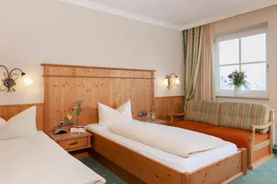 Ein Bett oder Betten in einem Zimmer der Unterkunft Hotel zur Post