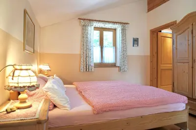 Ein Bett oder Betten in einem Zimmer der Unterkunft Ferienwohnung Dehnert