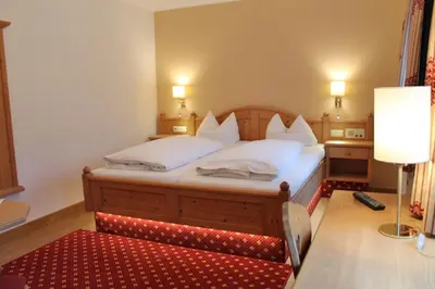 Ein Bett oder Betten in einem Zimmer der Unterkunft Hotel zur Post