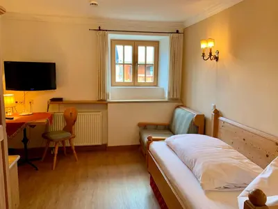 Ein Bett oder Betten in einem Zimmer der Unterkunft Hotel zur Post