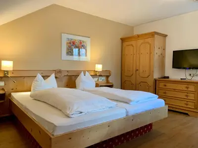 Ein Bett oder Betten in einem Zimmer der Unterkunft Hotel zur Post