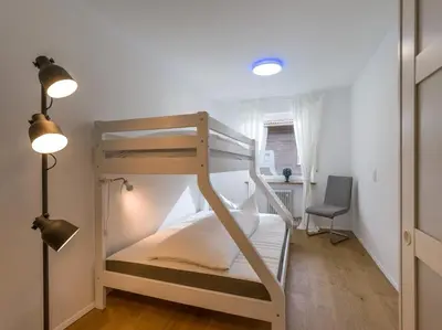 Ein Bett oder Betten in einem Zimmer der Unterkunft Moderne Bergstube mit 2 Schlafzimmer und großen Balkon