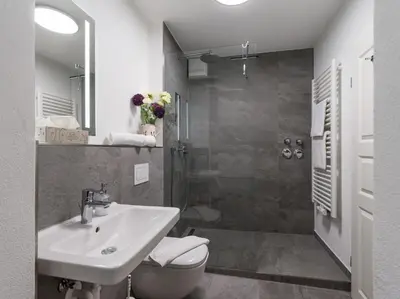 Ein Badezimmer in der Unterkunft Moderne Bergstube mit 2 Schlafzimmer und großen Balkon