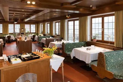Ein Restaurant oder anderes Speiselokal in der Unterkunft SeeHotel Wassermann