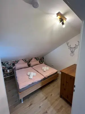 Ein Bett oder Betten in einem Zimmer der Unterkunft Ferienwohnung Bene