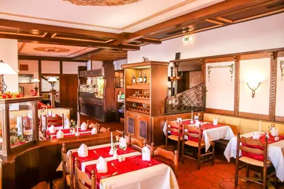Ein Restaurant oder anderes Speiselokal in der Unterkunft Hotel Centurio