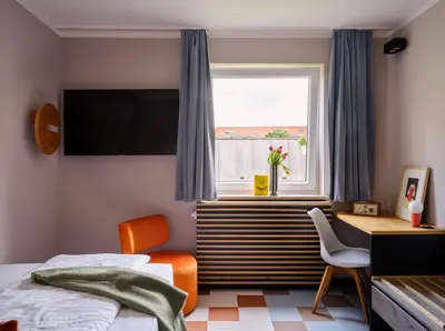 Ein Bett oder Betten in einem Zimmer der Unterkunft Flemings Hotel München-Schwabing