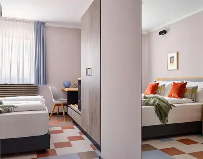 Ein Bett oder Betten in einem Zimmer der Unterkunft Flemings Hotel München-Schwabing
