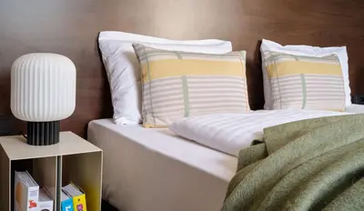 Ein Bett oder Betten in einem Zimmer der Unterkunft Flemings Hotel München-Schwabing