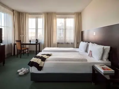 Ein Bett oder Betten in einem Zimmer der Unterkunft Flemings Hotel München-City