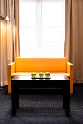 Ein Sitzbereich in der Unterkunft Flemings Hotel München-City