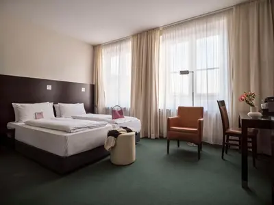 Ein Bett oder Betten in einem Zimmer der Unterkunft Flemings Hotel München-City