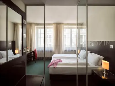 Ein Bett oder Betten in einem Zimmer der Unterkunft Flemings Hotel München-City