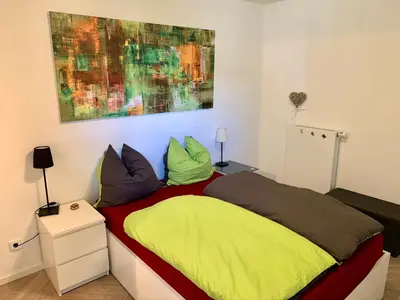 Ein Bett oder Betten in einem Zimmer der Unterkunft 123fewo Dießen am Ammersee