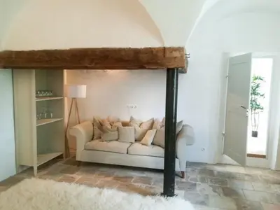 Ein Sitzbereich in der Unterkunft Ferienwohnung Hofmarkrichterhaus