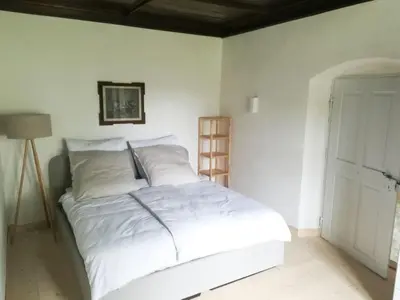 Ein Bett oder Betten in einem Zimmer der Unterkunft Ferienwohnung Hofmarkrichterhaus