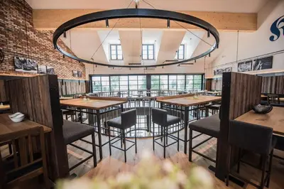 Ein Restaurant oder anderes Speiselokal in der Unterkunft Klosterbräu Schlehdorf