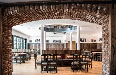 Ein Restaurant oder anderes Speiselokal in der Unterkunft Klosterbräu Schlehdorf