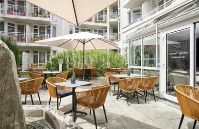 Ein Restaurant oder anderes Speiselokal in der Unterkunft Leonardo Hotel Muenchen City West