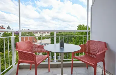 Ein Balkon oder eine Terrasse in der Unterkunft Leonardo Hotel Muenchen City West