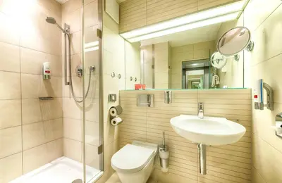 Ein Badezimmer in der Unterkunft Leonardo Hotel Muenchen City West