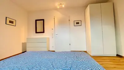 Ein Bett oder Betten in einem Zimmer der Unterkunft Ferienwohnungen Daserhaus Holiday Apartments
