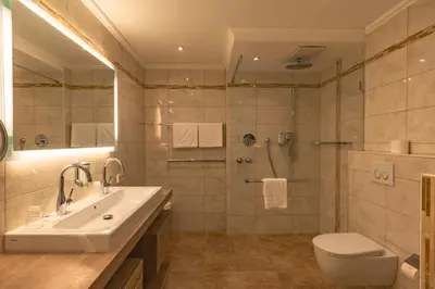 Ein Badezimmer in der Unterkunft Parkhotel Crombach